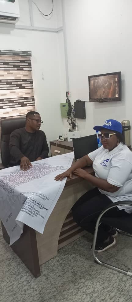 Dala Real Estate team reviewing property documents with a client