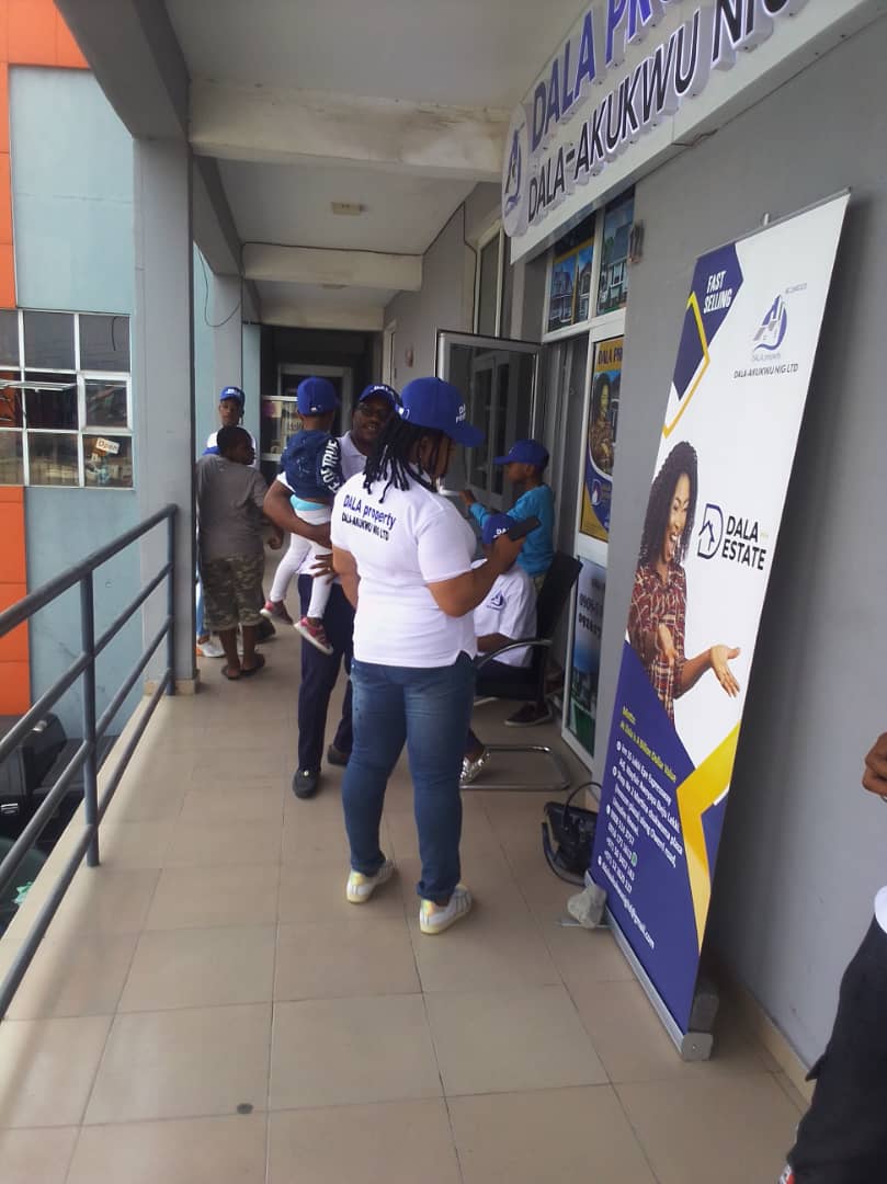 Dala Real Estate staff and visitors at the company office